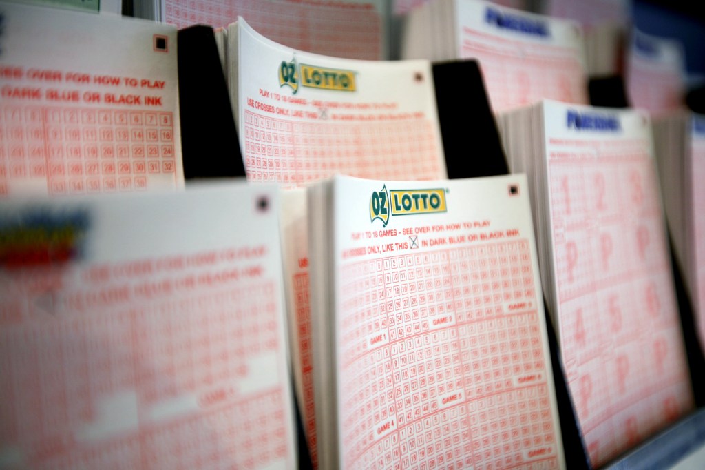 Lottery ticket forms arranged to be displayed on a New South Wales Lotteries Corp. retail store in Sydney, Australia