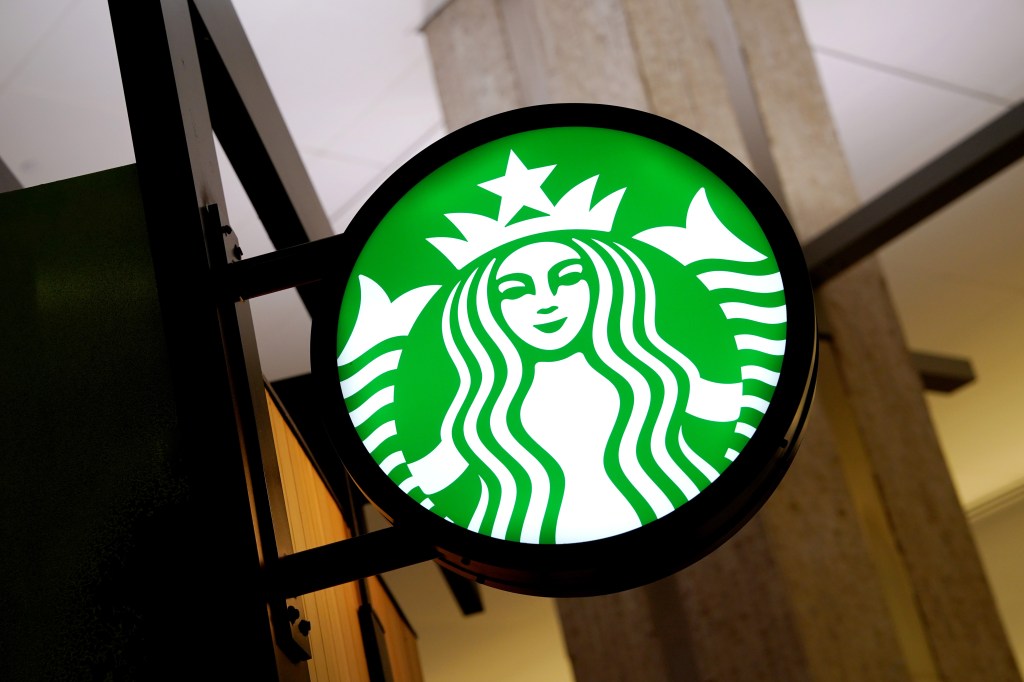 The interior view of a Starbucks shop inside Tampa International Airport, with the prominent Green Starbucks logo, Photo Take on August 29, 2024.