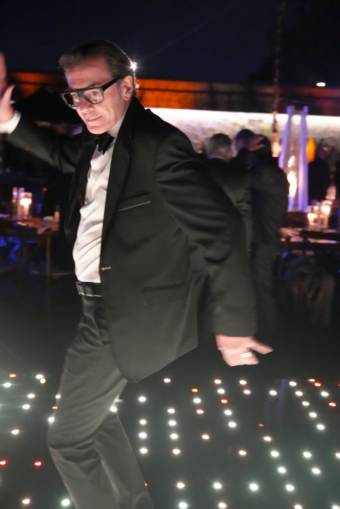 Leal Hewak and her daughters, Estv of and Sophia Catz, dancing at a stranger's wedding in Mexico