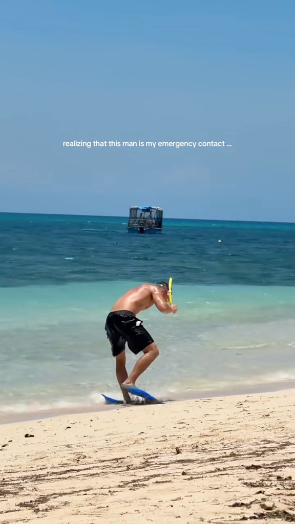 A man browsing on a beach