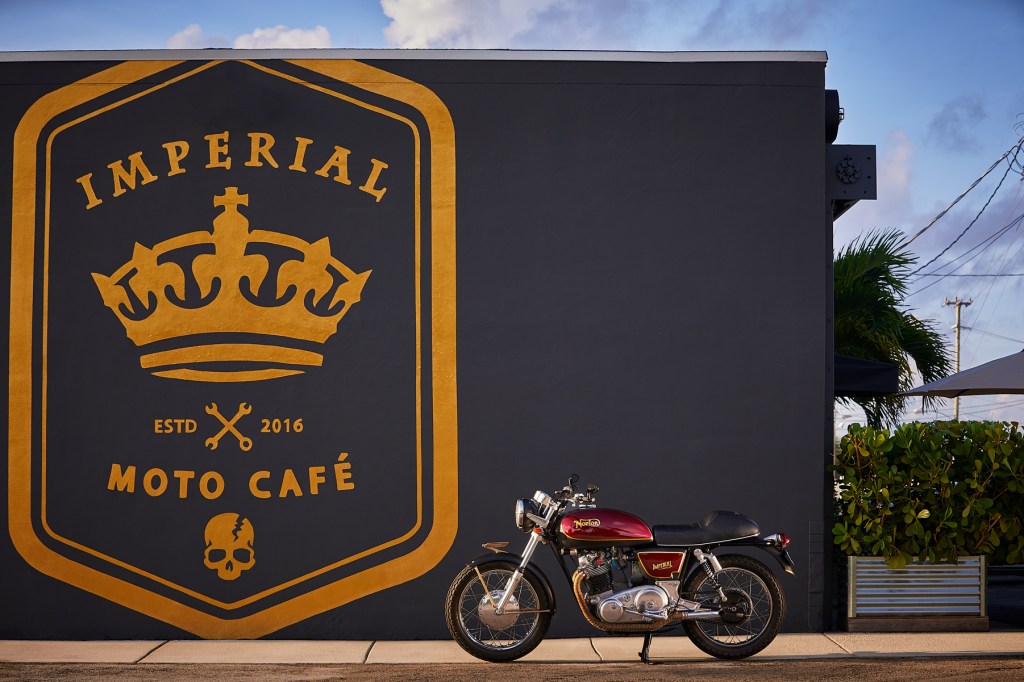 An engine parked in front of the Cafe Imperial Moto, a cafe inspired by Fast Hogs.