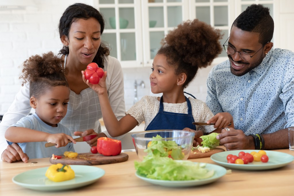 Happy family cooking together