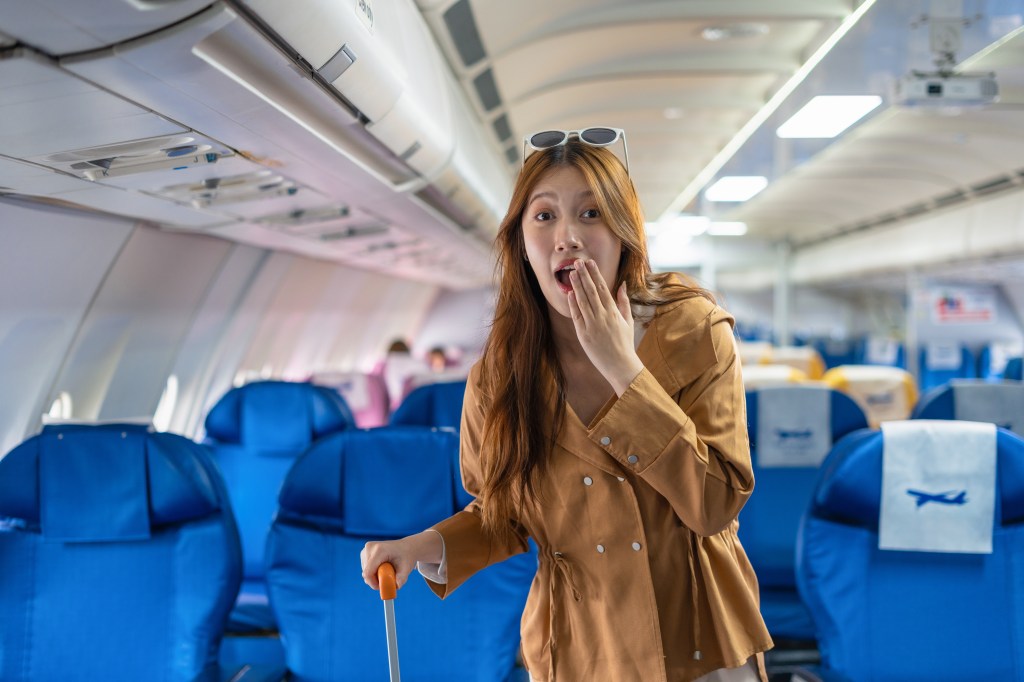 A woman shocked on the plane.