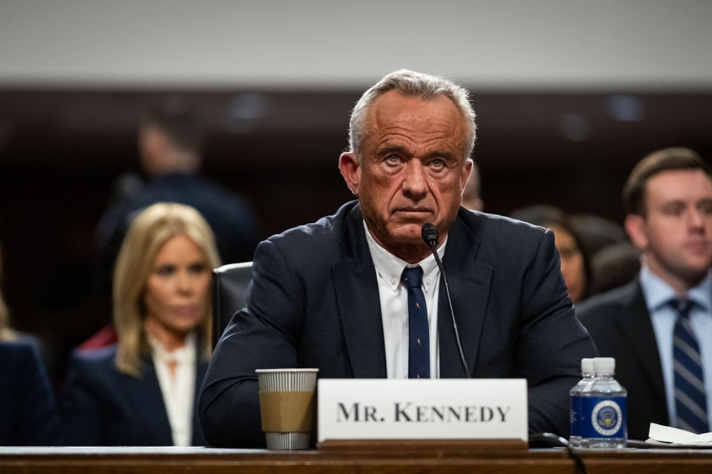 Robert F. Kennedy Jr., sitting at a table while hearing the confirmation of the Senate Finance Committee as the Nominee for Human Head and Human Services, January 2025.