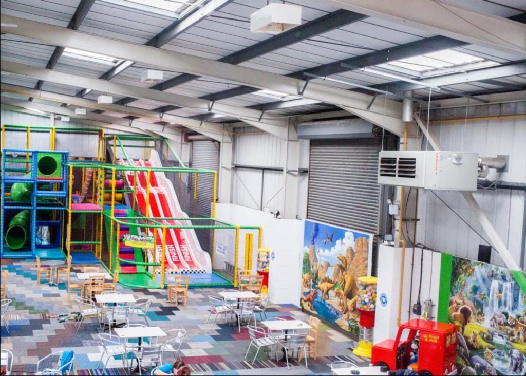 Interior of Play World in Gainborough, Lincolnshire showing a room with a slide and tables